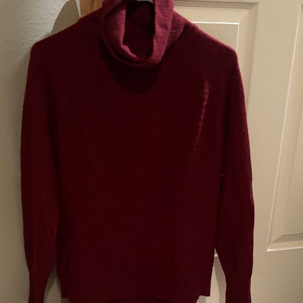 Women’s Burgundy Sweater. Detailed stitching on the front. Made by C&C